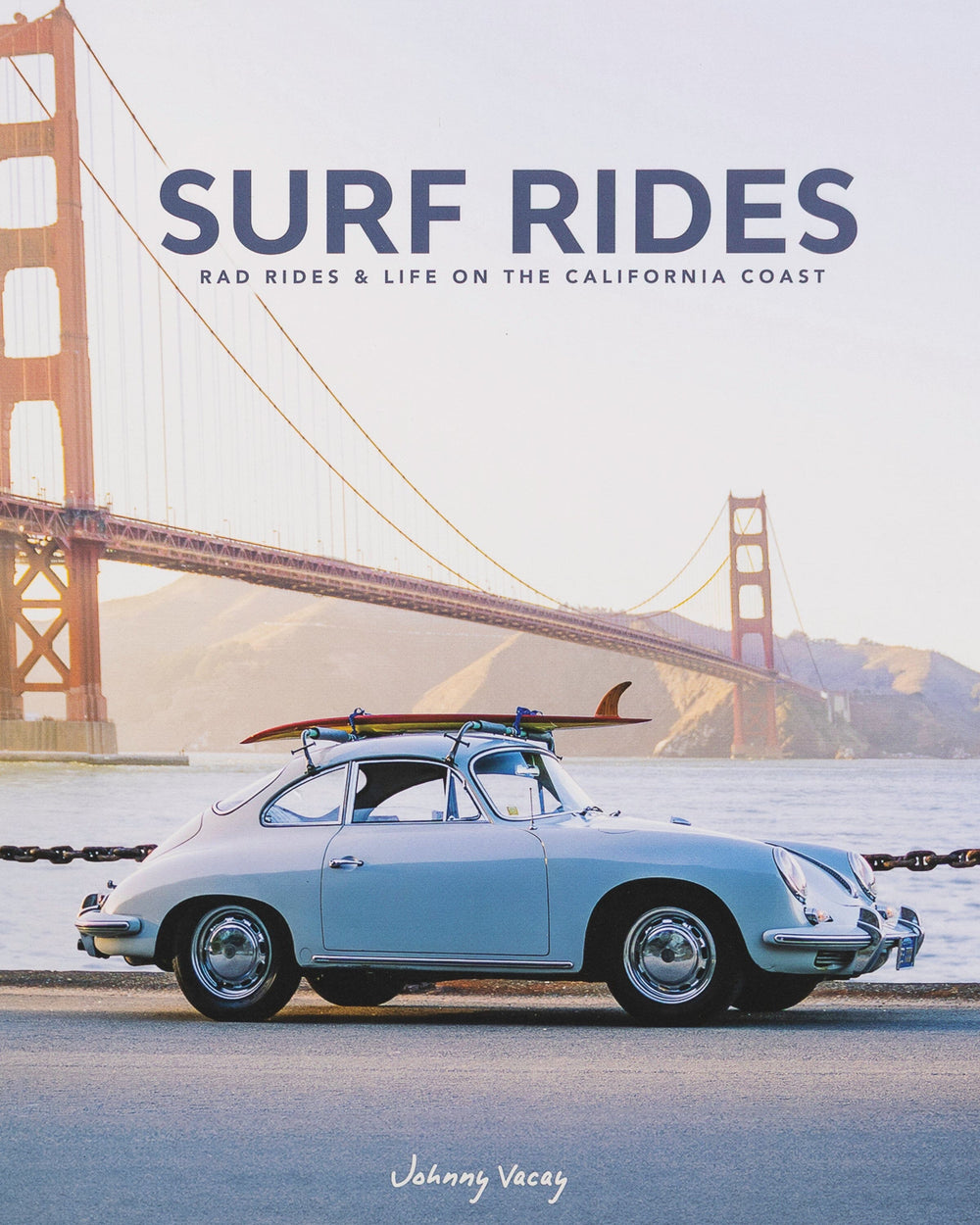 The detail view of the Johnny Vacay Surf Rides Coffee Table Book at Southern Tide - White