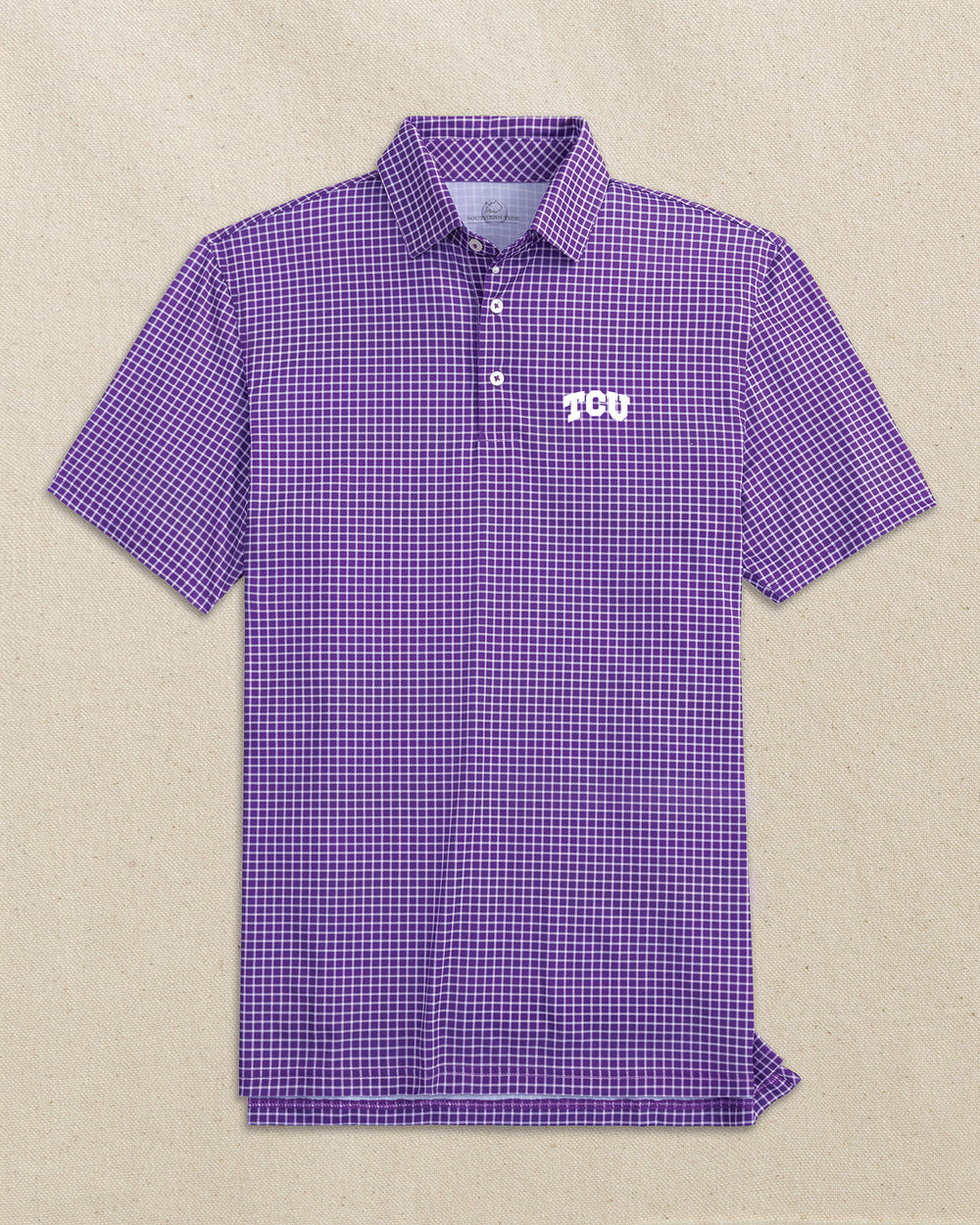 The front view of the Southern Tide TCU Horned Frogs Driver Dunes Edge Plaid Polo by Southern Tide - Regal Purple