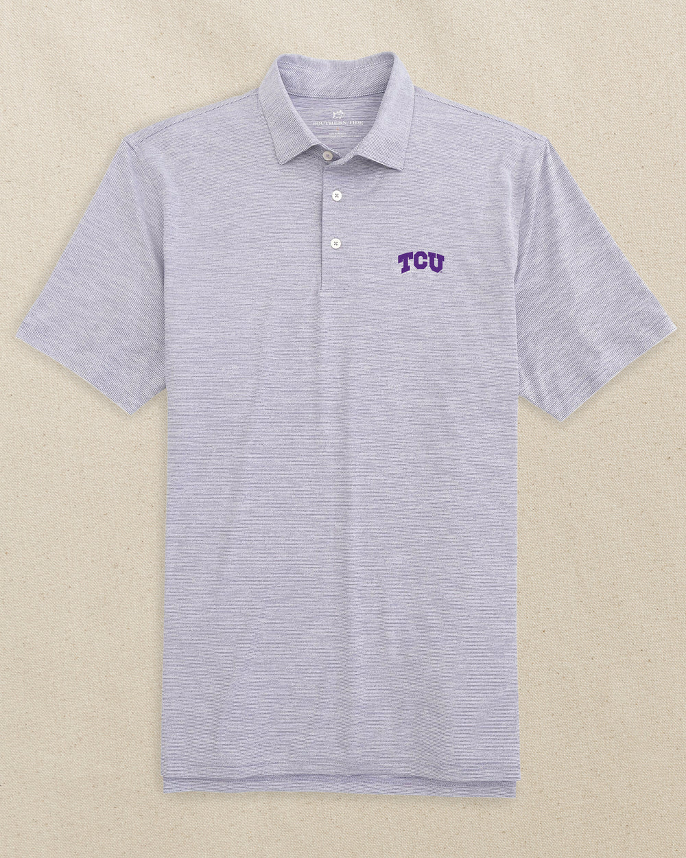 The front view of the Southern Tide TCU Horned Frogs Driver Spacedye Polo Shirt by Southern Tide - Regal Purple