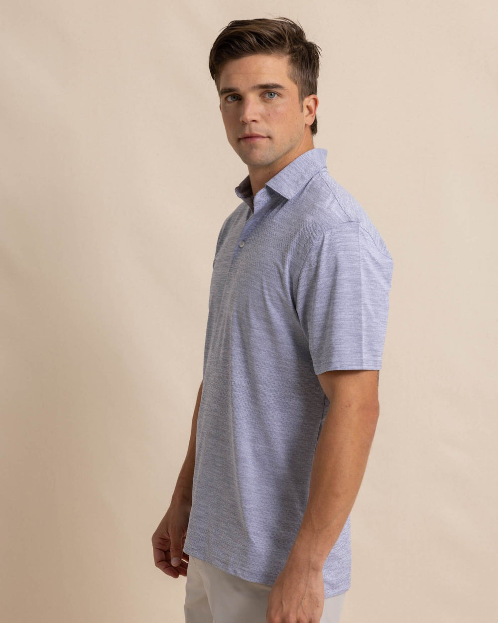 The front view of the Southern Tide Team Colors Driver Spacedye Polo Shirt by Southern Tide - Navy