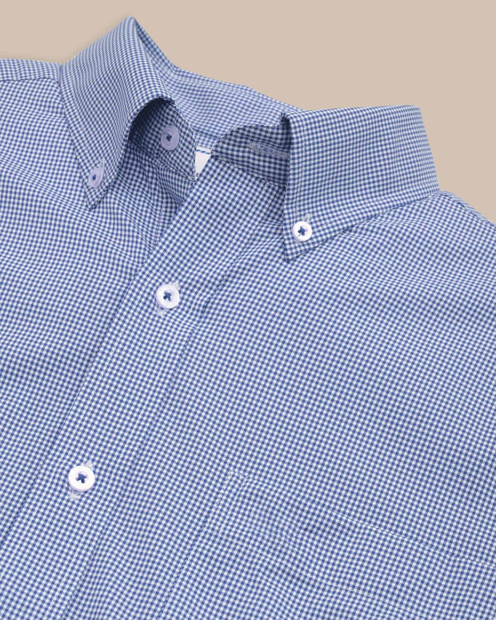 The detail view of the Southern Tide Team Colors Gingham Intercoastal Sport Shirt by Southern Tide - University Blue