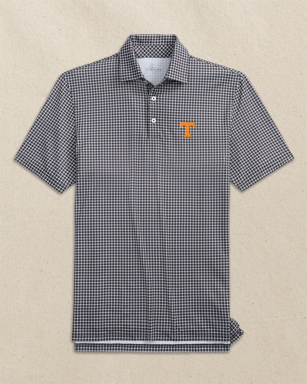 The front view of the Southern Tide Tennessee Vols Driver Dunes Edge Plaid Polo by Southern Tide - Black