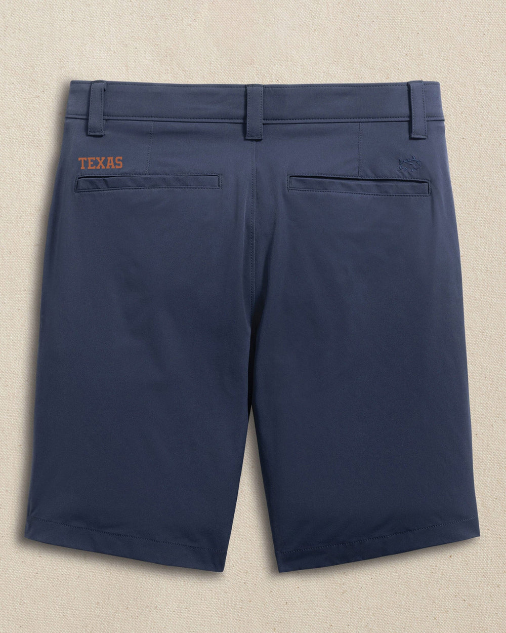The back view of the Southern Tide Texas Longhorns brrr°®-die 8" Performance Short by Southern Tide - True Navy