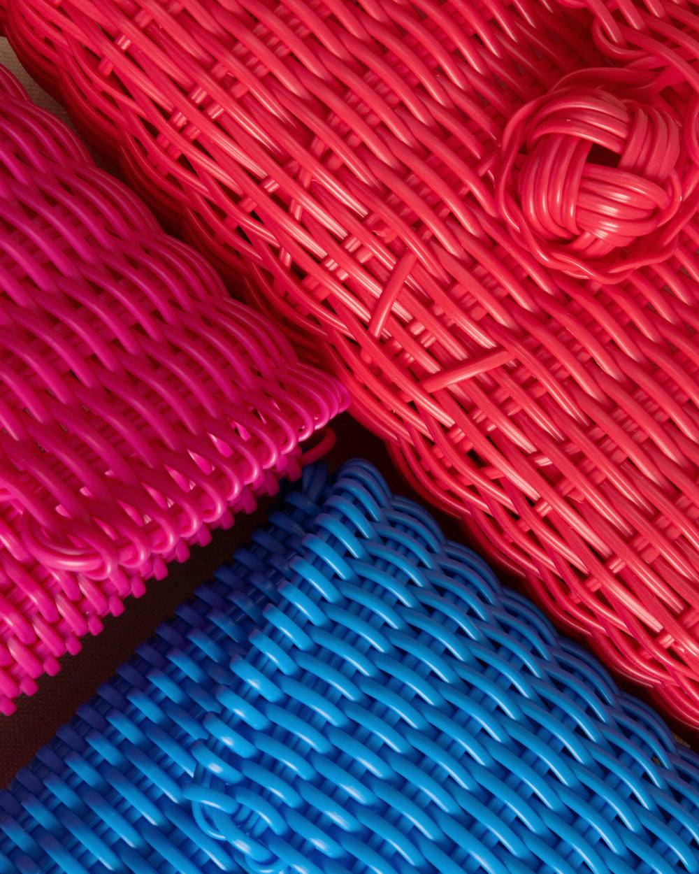 The detail view of the Southern Tide The Lilley Line Clutch in Rose Red by Southern Tide - Rose Red