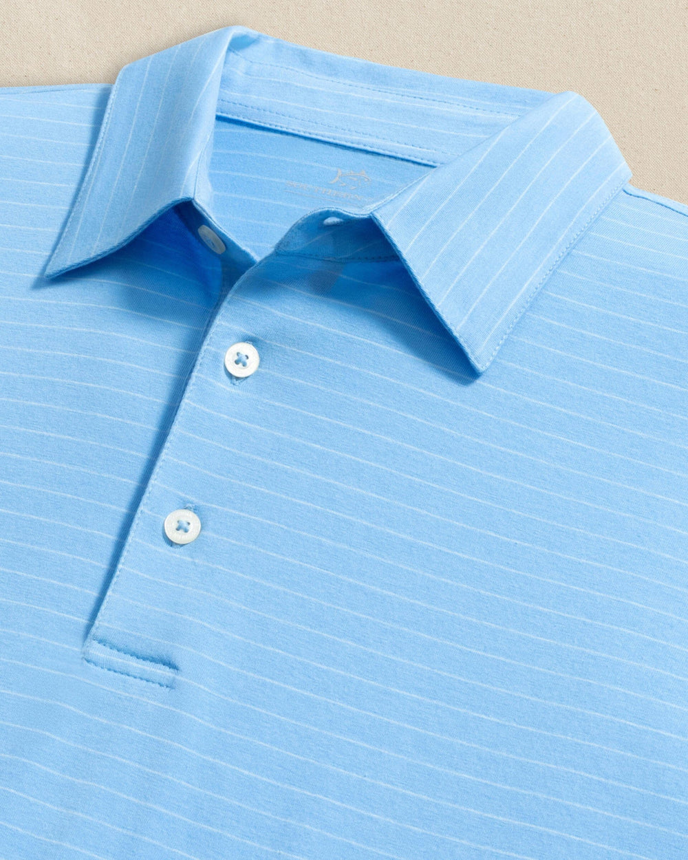The detail view of the Southern Tide The Seaport Kinston Stripe Polo by Southern Tide - Ocean Channel