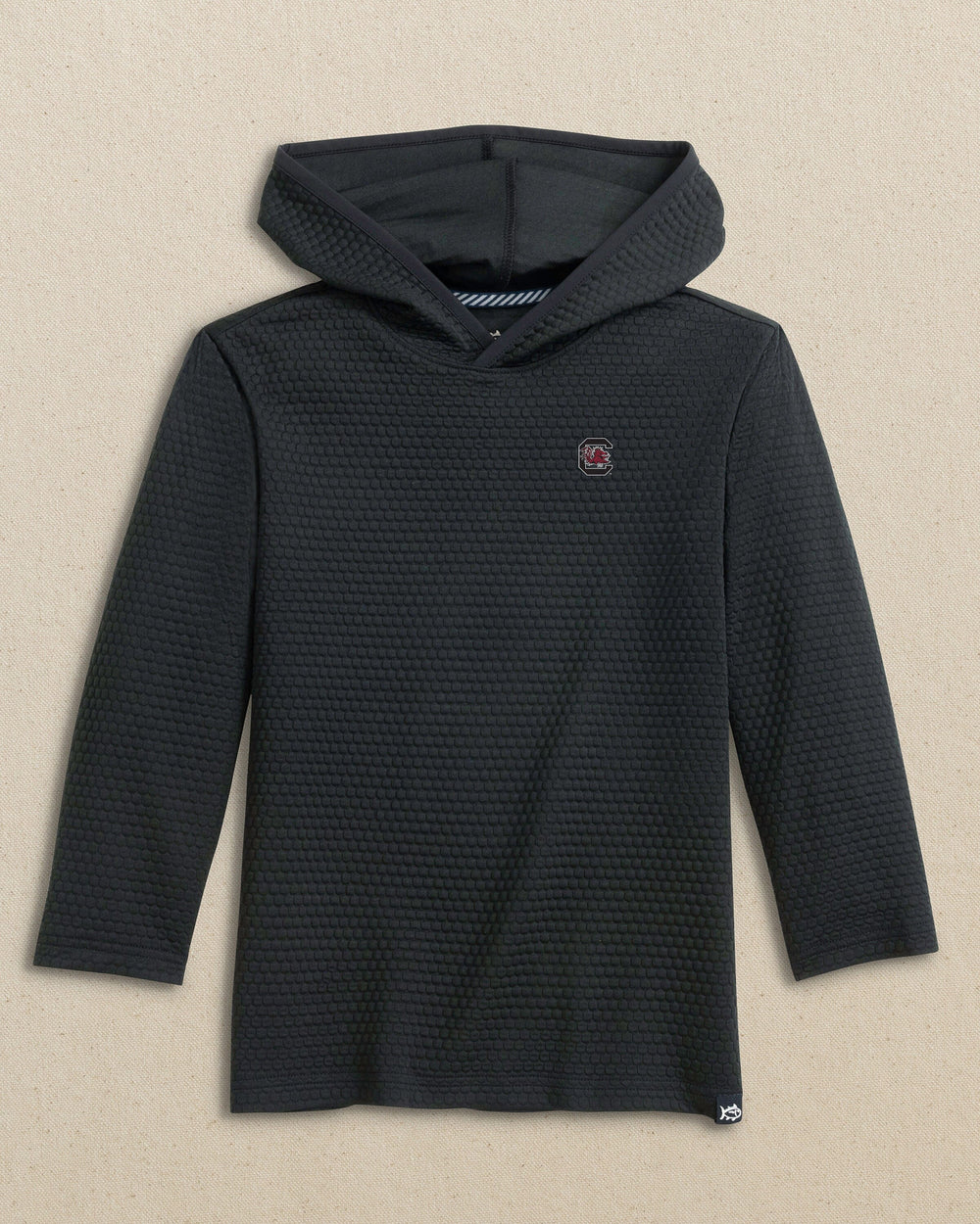The front view of the Southern Tide USC Gamecocks Boys Scuttle Hoodie by Southern Tide - Caviar Black