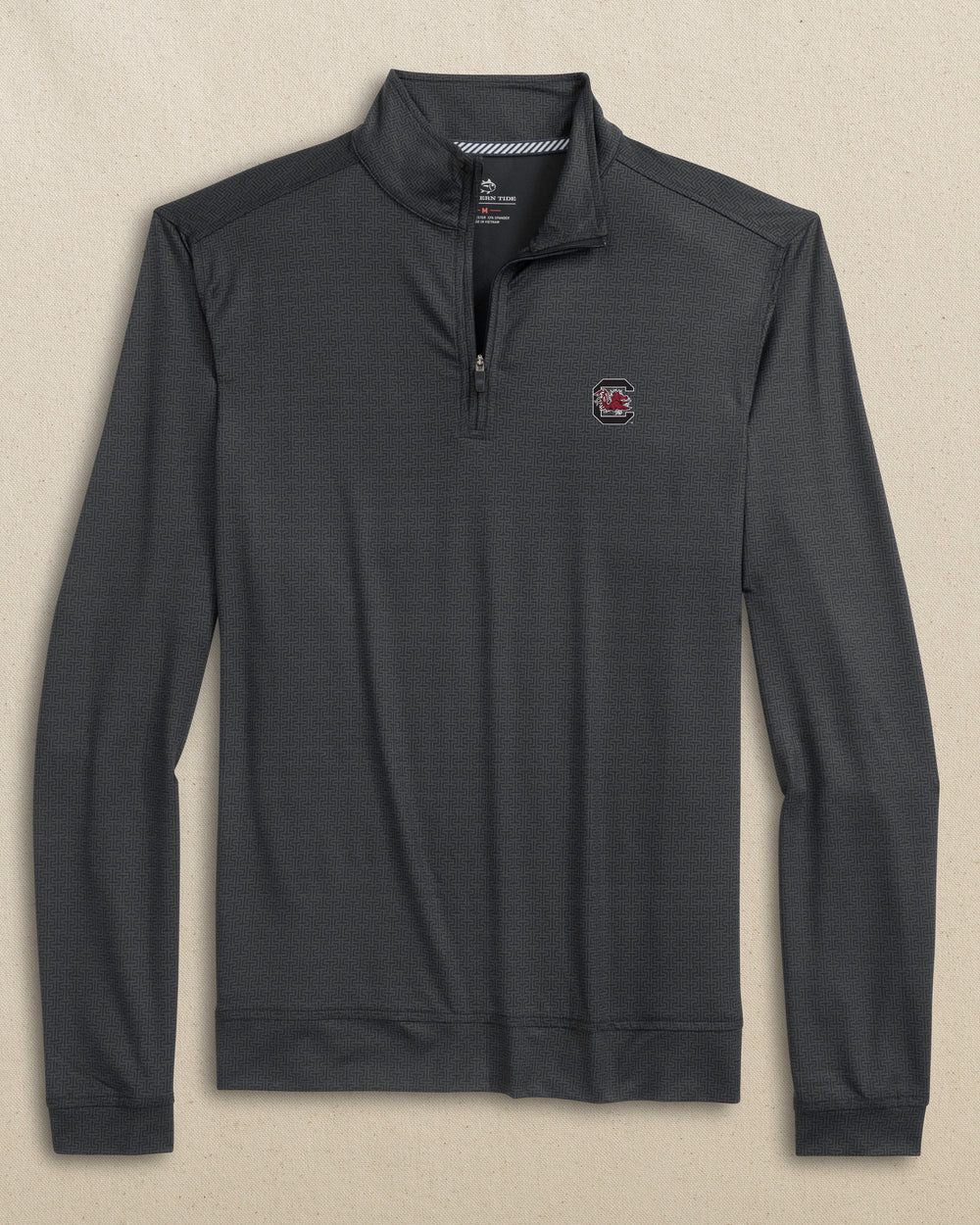 The front view of the Southern Tide USC Gamecocks Cruiser ST Geo Printed Quarter Zip by Southern Tide - Caviar Black