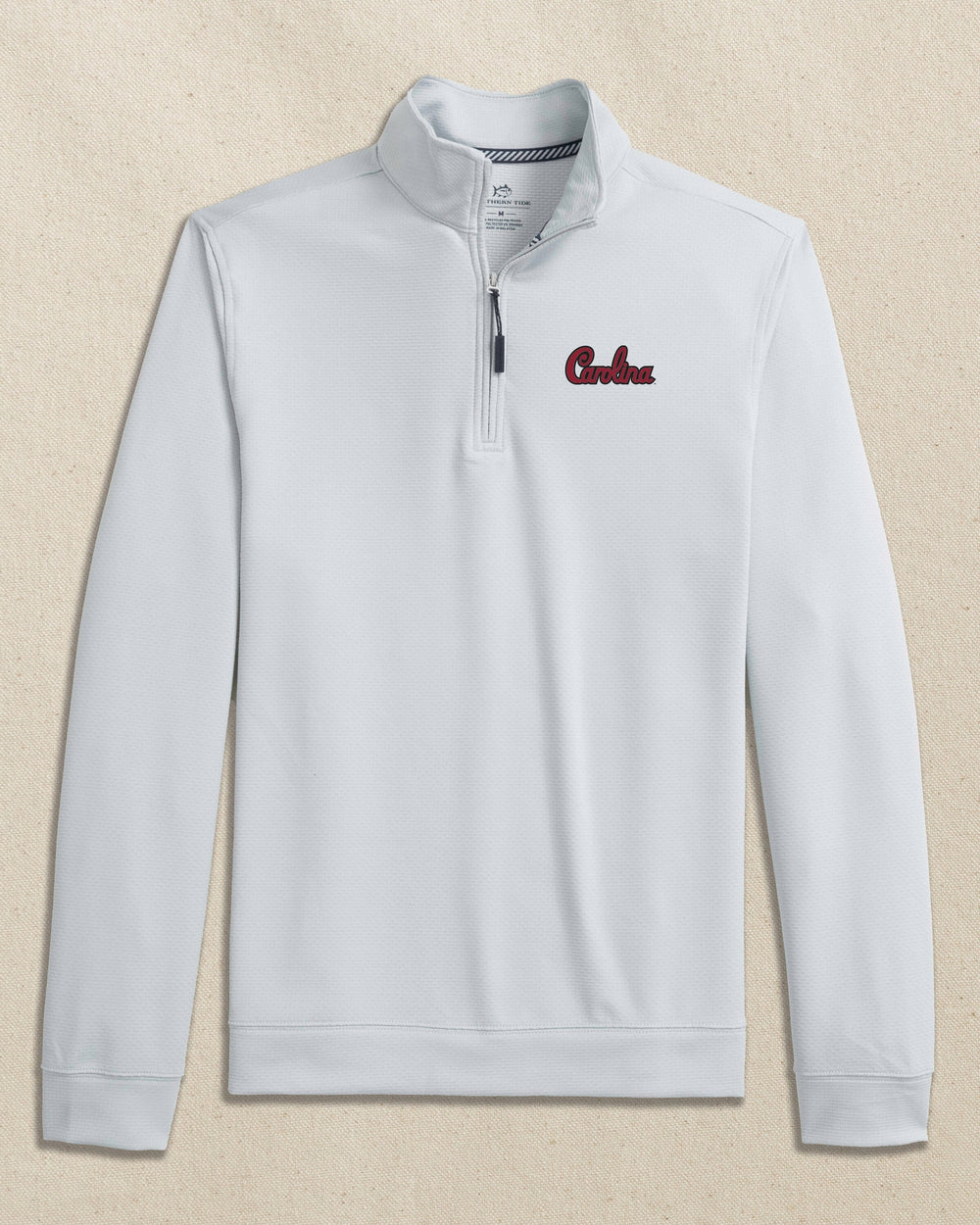 The front view of the Southern Tide USC Gamecocks Schooner Quarter Zip Carolina Script by Southern Tide - Slate Grey