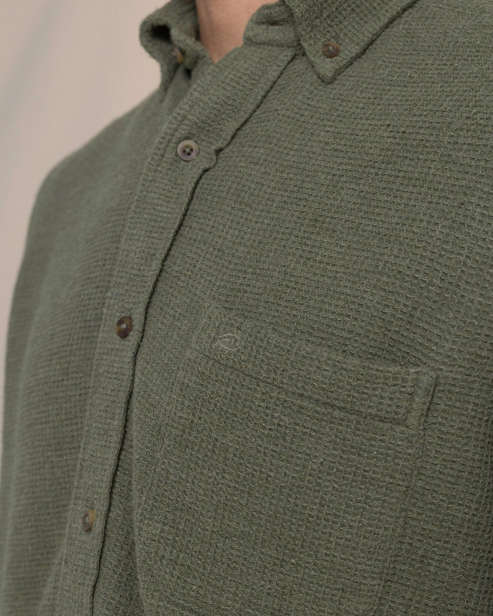 The detail view of the Southern Tide Waffle Weave Heather Sport Shirt by Southern Tide - Heather Cedar Green