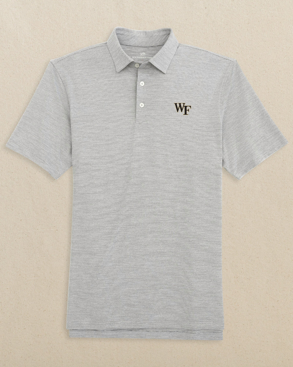 The front view of the Southern Tide Wake Forest Demon Deacons Driver Spacedye Polo by Southern Tide - Black