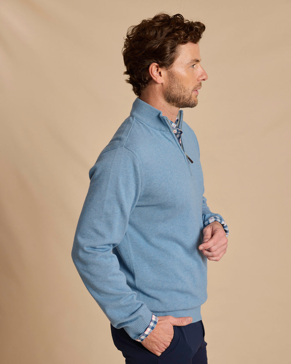 The side view of the Southern Tide Whitehaven Heather Quarter Zip Sweater by Southern Tide - Heather Ocean Channel