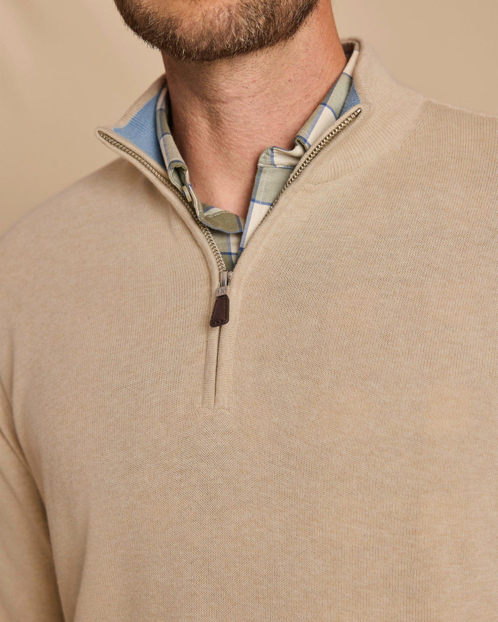 The detail view of the Southern Tide Whitehaven Heather Quarter Zip Sweater by Southern Tide - Heather Sand Dunes