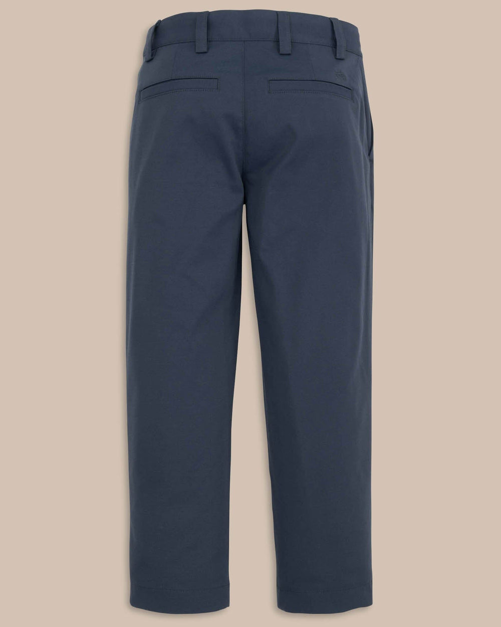 The back view of the Youth Leadhead Performance Pant by Southern Tide - True Navy