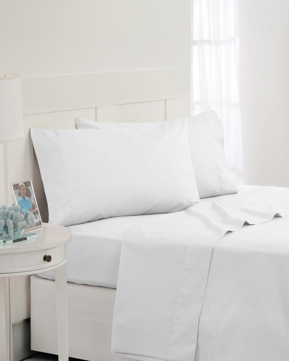The angle front view of the Southern Tide Cotton Twill Sheet Set by Southern Tide - White
